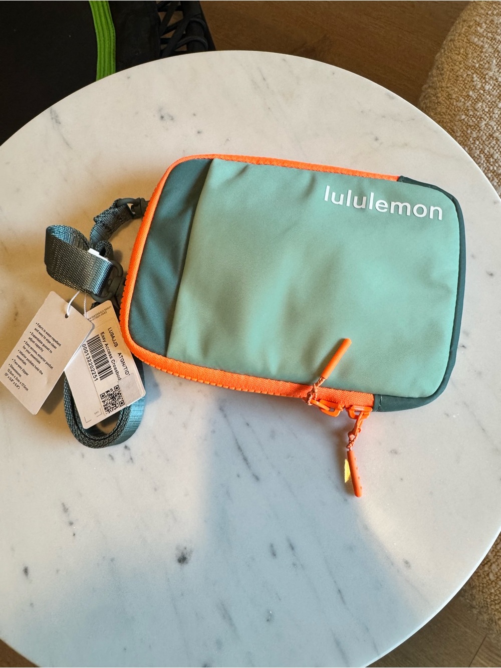 lululemon athletica mint green and orange crossbody bag
